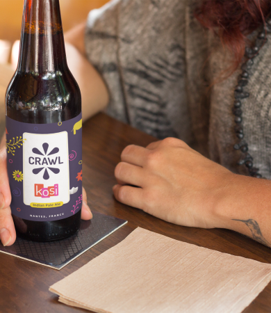 label-mockup-of-a-tattooed-woman-having-a-beer-at-a-bar-a6857